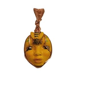 Clay face bee pendant